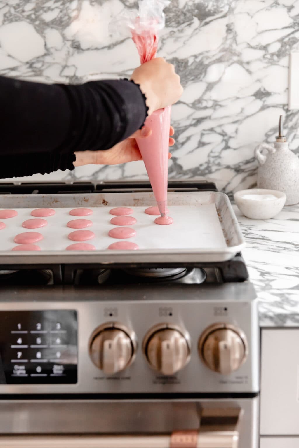 Piping onto baking sheet